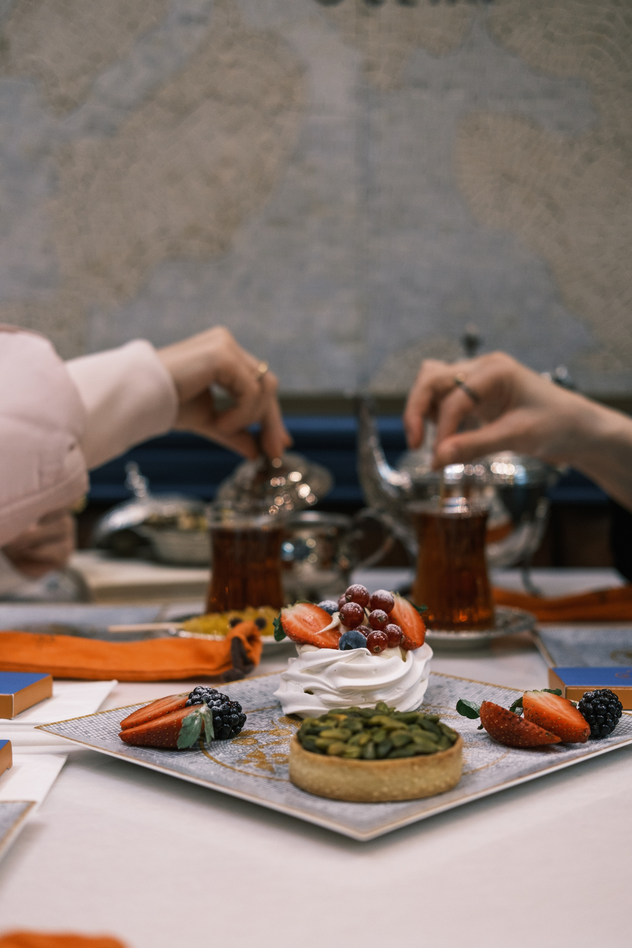 Friends Having Turkish Tea and Pastries